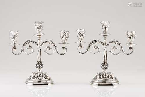 A pair of three branch candelabraPortuguese silver Profuse d...