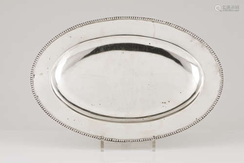 An elliptic serving platterPortuguese silver Plain centre of...