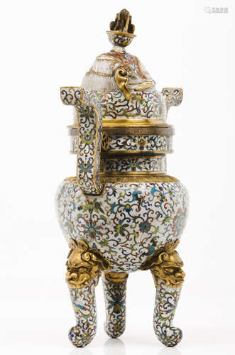 A large cloisonné incense burner with coverDecorated with po...