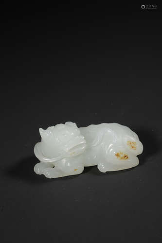 A White Jade Carving Of A Mythical Beast