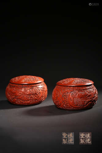 A Pair Of Cinnabar Lacquer Round Jars And Covers