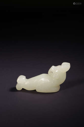 A White Jade Carving Of A Bird