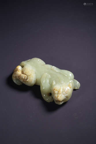 A Carved White Jade Mythical Beast Ornament