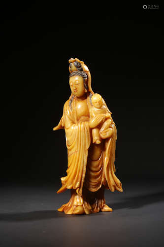 A Carved Tianhuang Stone Guanyin Statue