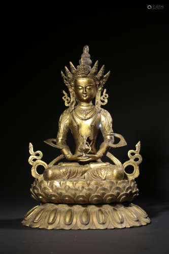 A Gilt Bronze Statue Of Longevity Buddha