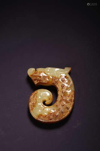 A Carved Jade Fish And Dragon Pendant