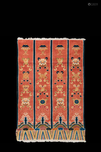 An Embroidered Eight Emblems Carpet