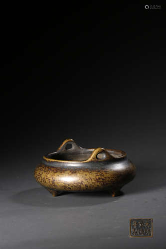 A Bronze Upper-Eared Tripod Incense Burner