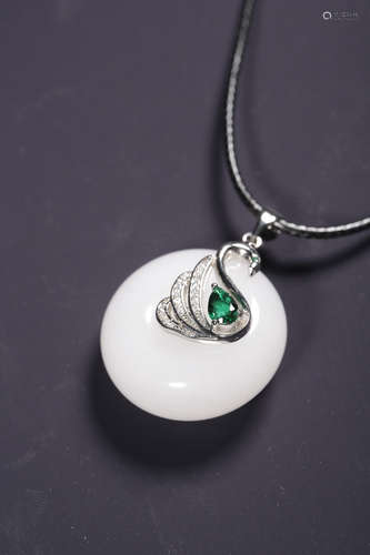 An Inlaid White Jade Pendant