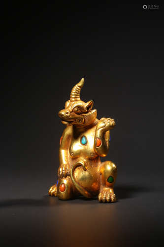 A Gems Inlaid And Gilt Bronze Mythical Beast Ornament