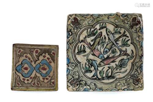 A PERSIAN TILE AND A SMALLER TILE