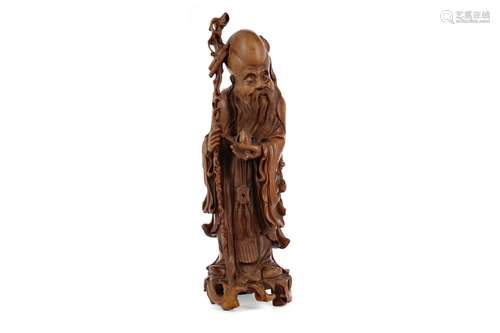 A LARGE CHINESE CARVED WOOD FIGURE