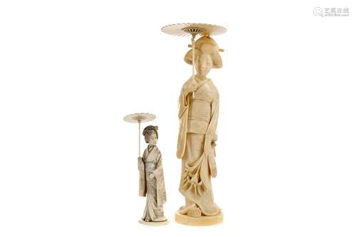 AN EARLY 20TH CENTURY JAPANESE CARVING OF A GEISHA AND ANOTH...