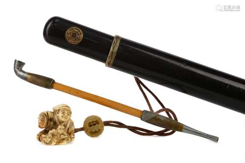 A JAPANESE LACQUERED OPIUM PIPE CASE AND PIPE