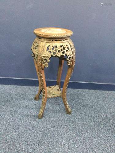 AN EARLY 20TH CENTURY CHINESE IRONWOOD PLANT TABLE