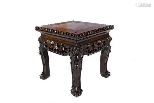 AN EARLY 20TH CENTURY CHINESE SQUARE IRONWOOD TABLE