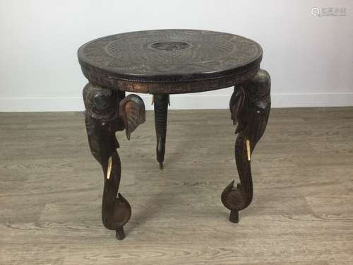 A 20TH CENTURY INDIAN CARVED WOOD CIRCULAR TEA TABLE