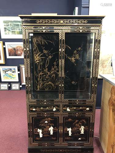 A 20TH CENTURY CHINESE LACQUERED DISPLAY CABINET