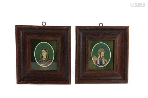 A PAIR OF INDIAN OVAL MINIATURE HEAD AND SHOULDER PORTRAITS