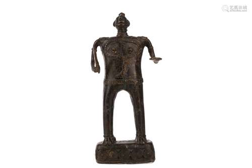 A BENIN BRONZE OF A MALE FIGURE