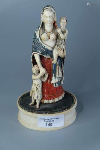 A 17/18THC INDIAN CRAVED IVORY MOTHER AND BOYS ,H 17.8CM