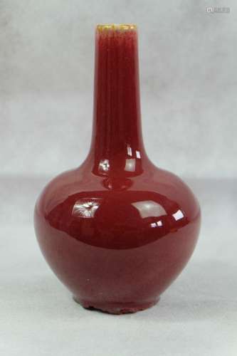 A CHINESE OX BLOOD RED BOTTLE VASE , HEIGHT 18.5CM