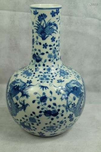  A LARGE CHINESE BLUE AND WHITE BOTTLE VASE WITH 4 CHARACTER...