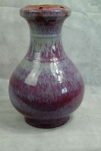 A CHINESE FLAMBE BOTTLE VASE, THE RED BODY WITH LAVENDER STR...