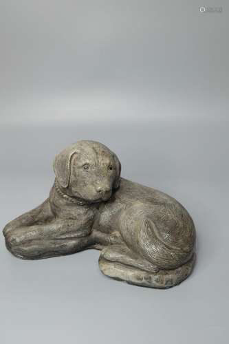 A LARGE STONE CRAVED DOG DOOR STOP