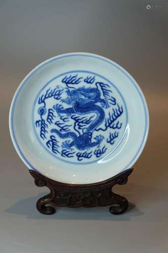 A CHINESE BLUE AND WHITE DARGON PLATE WITH HARDWOOD STAND,D ...