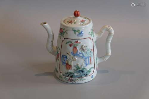 A CHINESE HIGH RELIF FAMILLE ROSE TEA POT ,H 13CM.