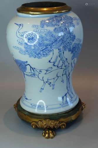 A CHINESE BLUE AND WHITE VASE WITH BRONZE FITTING,DRILLED ,H...