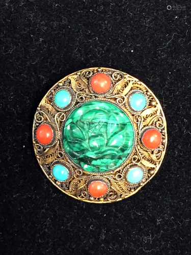 Brooch.