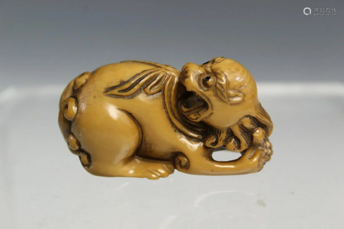 Japanese carving of a dog