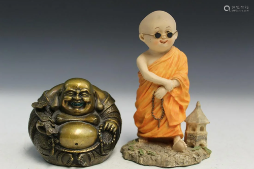 Two Asian Monk Figurines