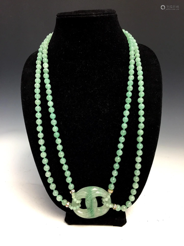 Chinese jadeite necklace with big jadeite pendant.