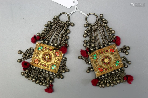 A pair of antique Chinese minority ethnic group silver