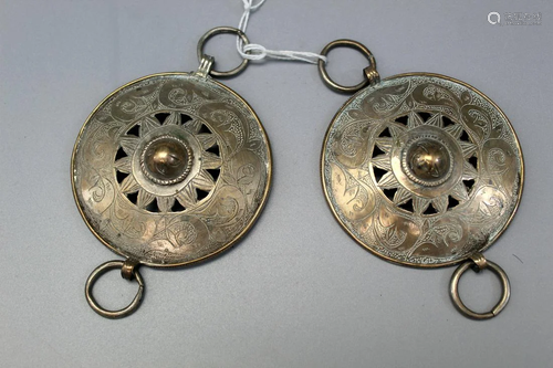 A pair of antique Chinese minority ethnic group metal