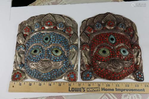 Two vintage Buddhist masks.