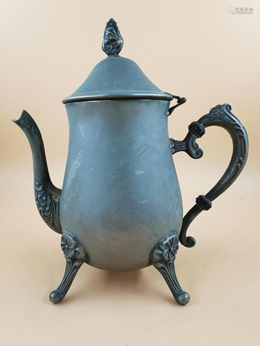 A silver coffee pot