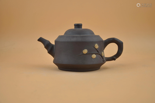 A purple clay teapot