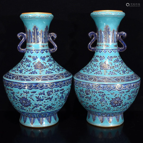 A pair of turquoise-glazed double-ear garlic vase with