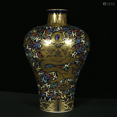 A plum vase with blue and enamel enamel depicting gold