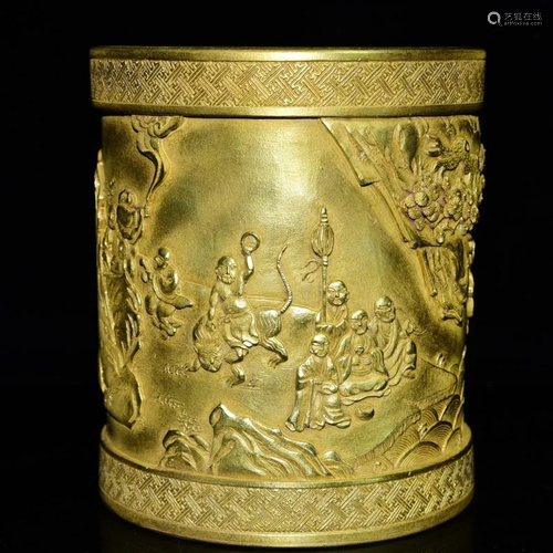 A gilt pen holder with eighteen arhat patterns carved