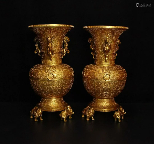 A gilt dragon and phoenix vase from the Qing Dynasty.