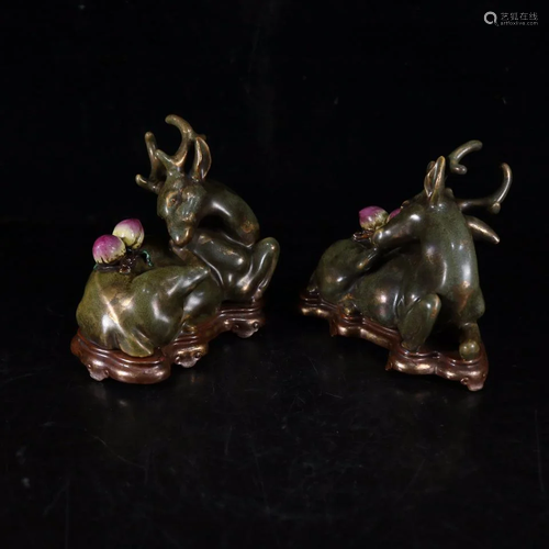 A pair of gilt deer with tea foamSpecification