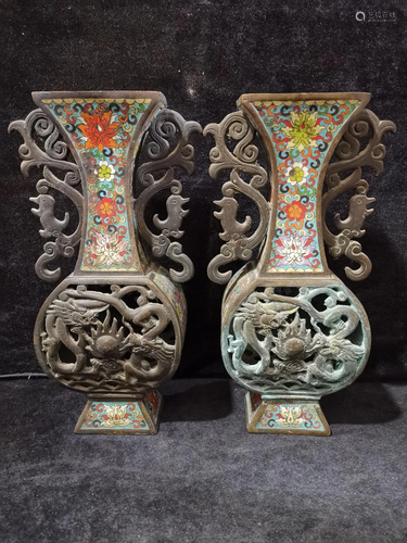 A pair of cloisonne hollow double dragon and phoenix