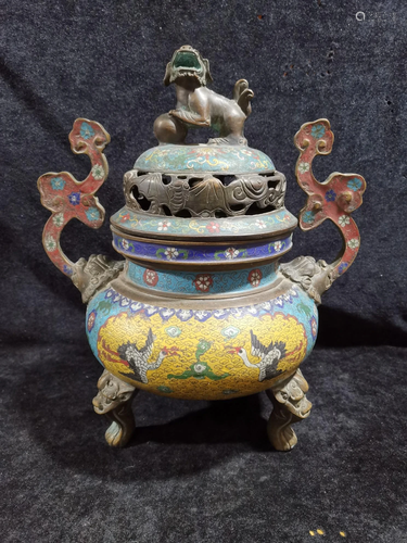 An old collection of cloisonne incense burners in the