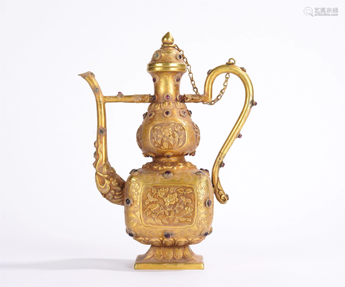 A CHINESE INCISED GILT BRONZE EWER