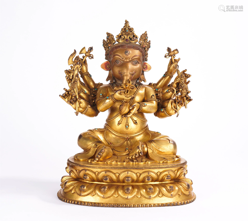 A CHINESE GILT BRONZE FIGURE OF BUDDHA